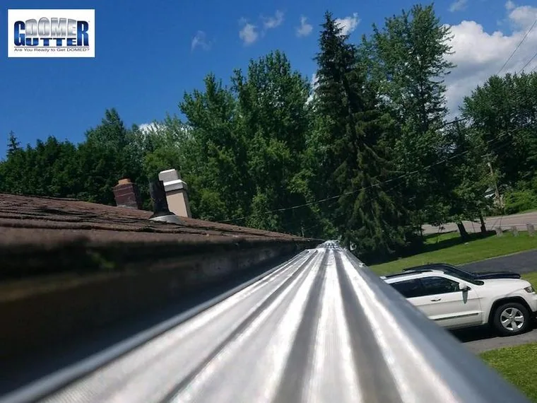 A completed GutterDome gutter protection installation on a residential roof.