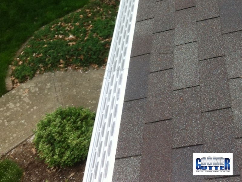 GutterDome gutter guard walkway view — residential installation example